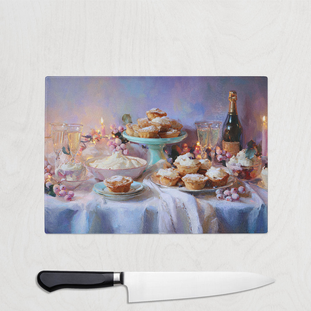 Framed painting of a table with pastries and a bottle of champagne on a light gray background