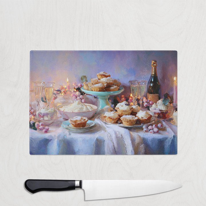 Framed painting of a table with pastries and a bottle of champagne on a light gray background