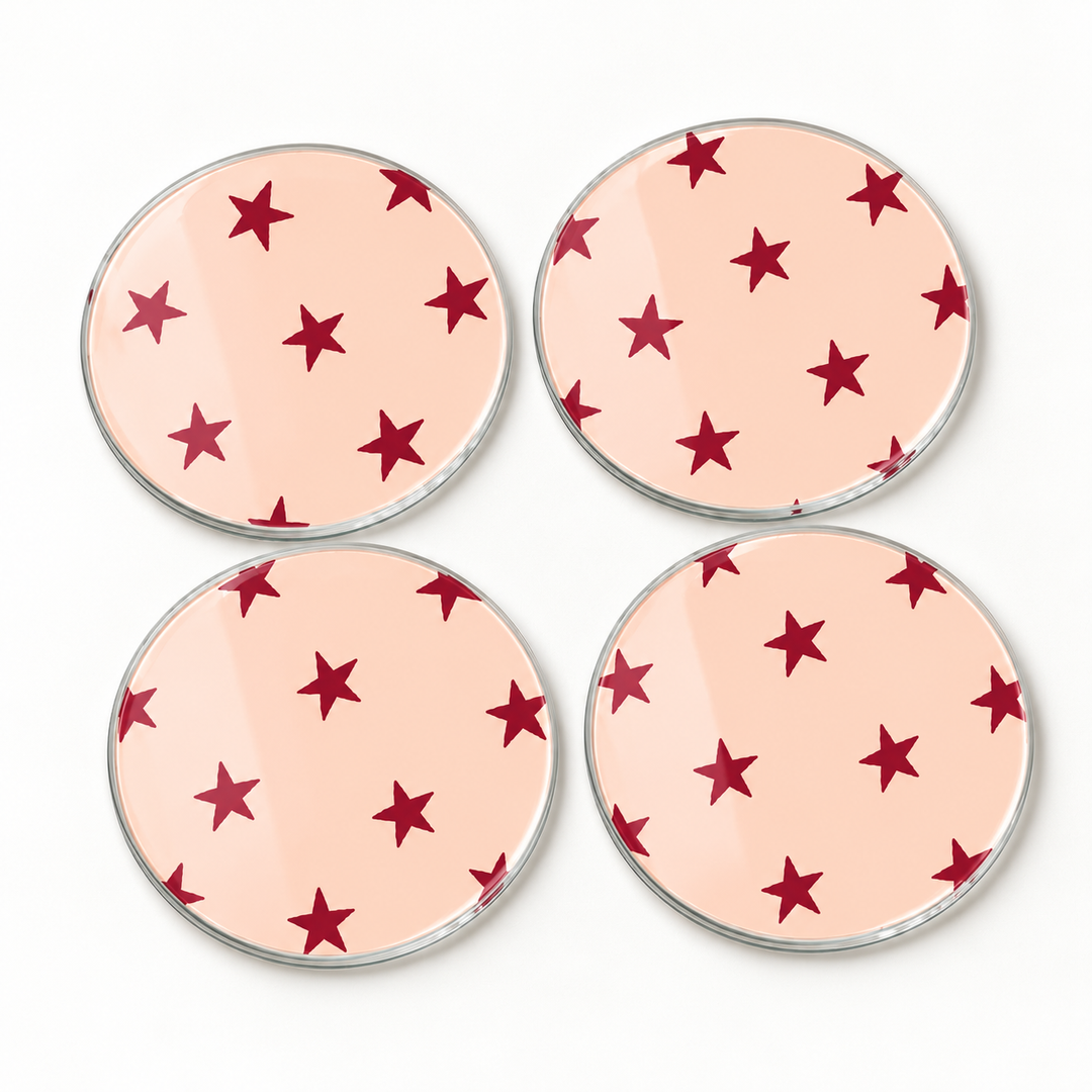 Burgundy Star Christmas 4 Piece Glass Coaster Set Mock on white backgrounf