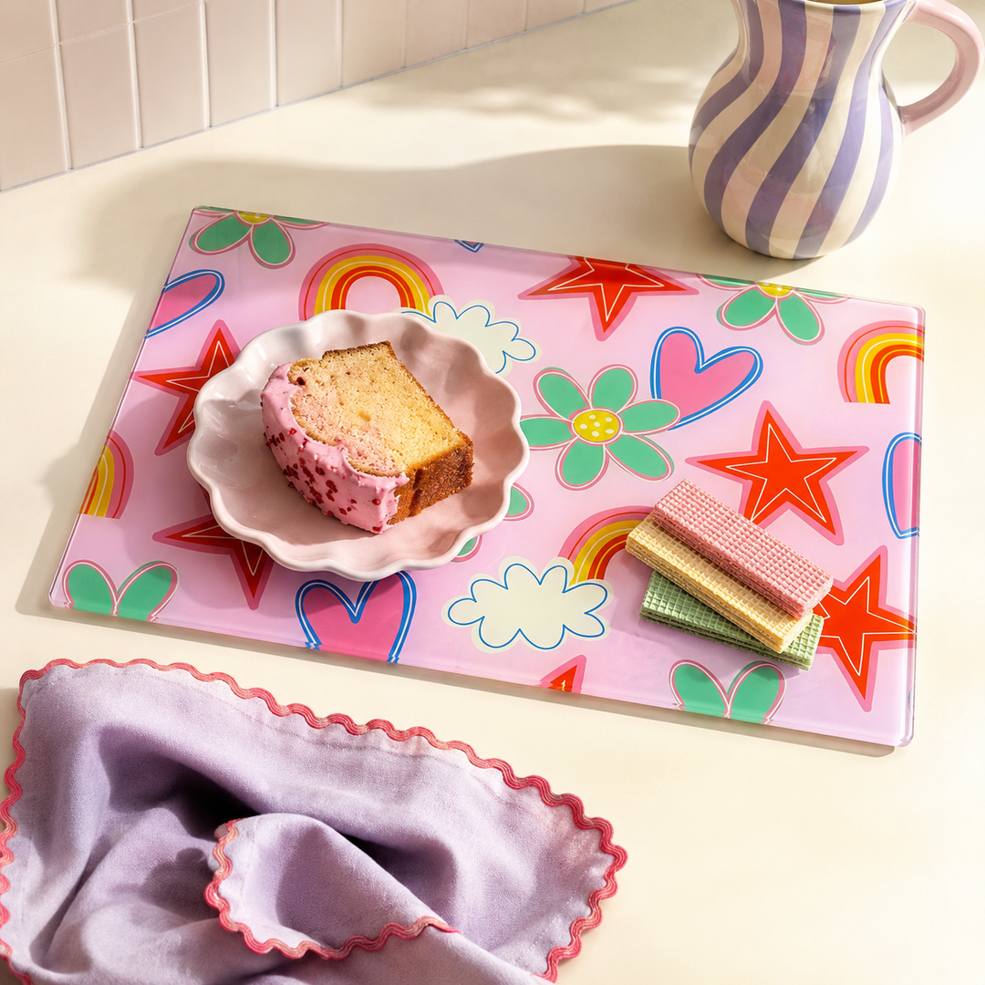 Colourful Glass Worktop Saver With playful
Pink pattern with cake and a tea towel 