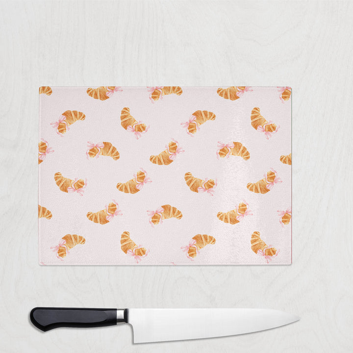 Cute Croissant glass chopping board with buttery croissants tied with pink bows
