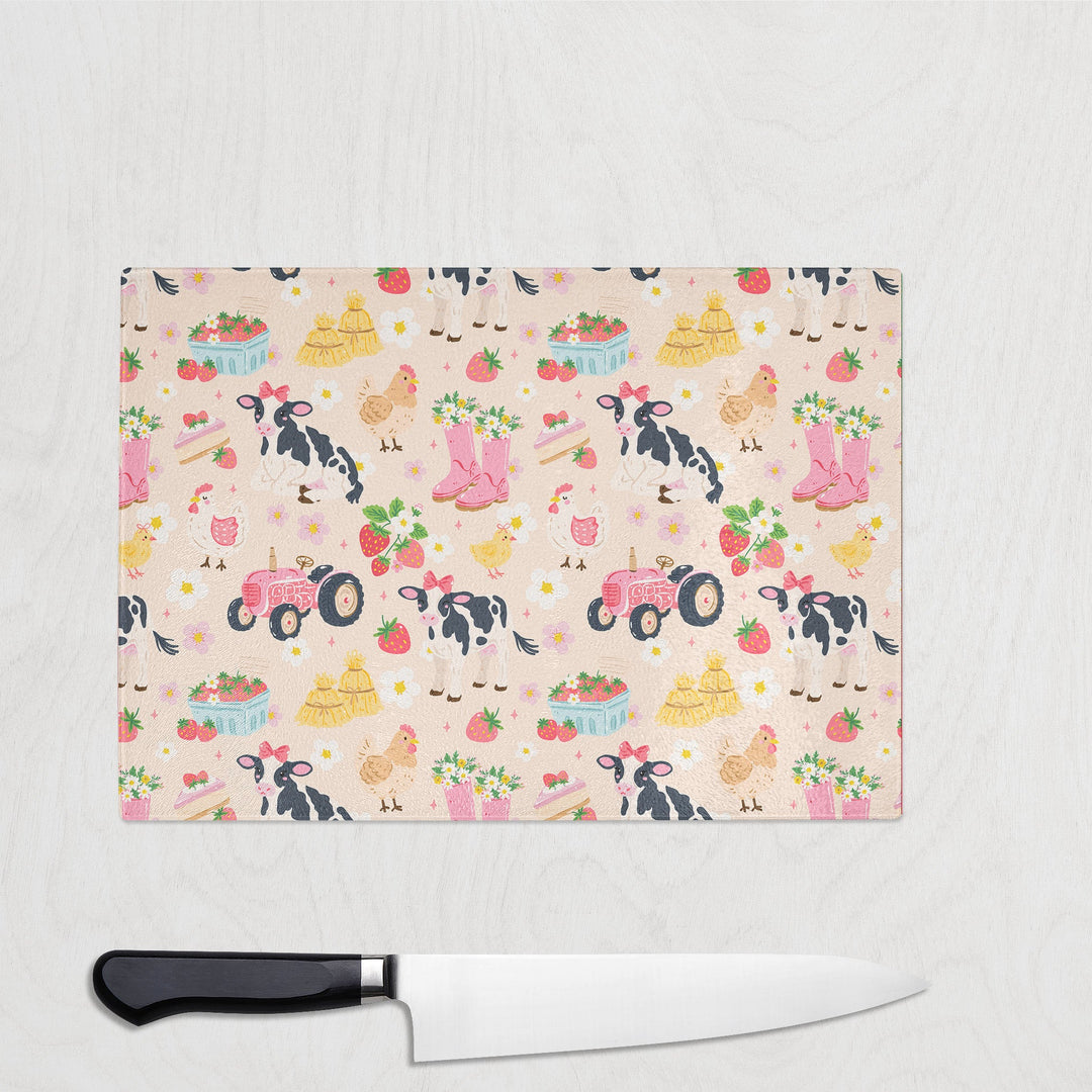 Cute Farmyard Life glass chopping board with cows, chickens, tractors and strawberries