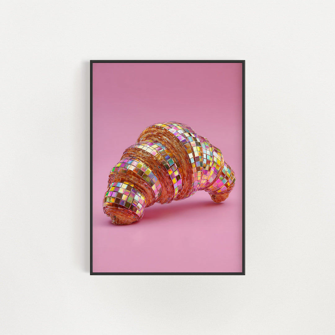 Framed artwork of a colorful croissant on a pink background