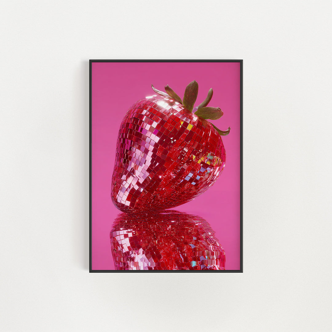 Framed artwork of a glittery strawberry on a pink background