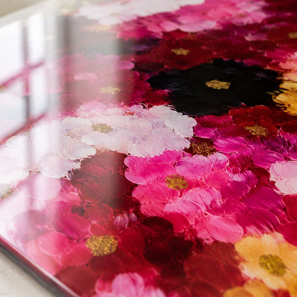 Close-up of a floral-patterned worltop saver  with pink, red, and yellow flowers.