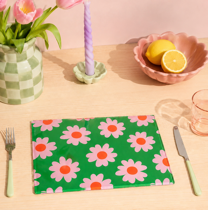Green Pink Flower placemat on a table with pink tulips, lemons, and a candle.