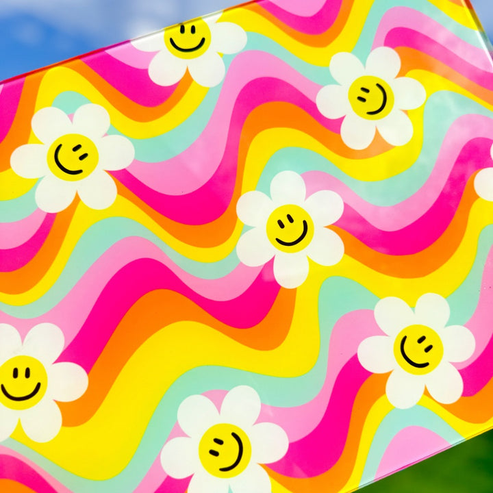 Regenbogen-Wellen-Blumen-Smiley-Glasschneidebrett