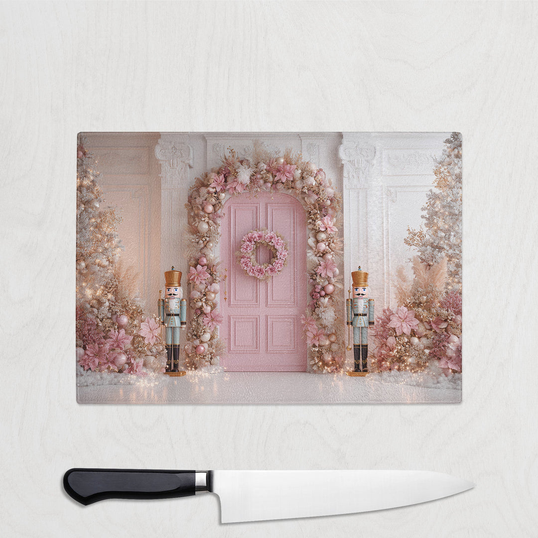 Pastel pink Nutcracker Christmas chopping board with floral wreath and festive decorations