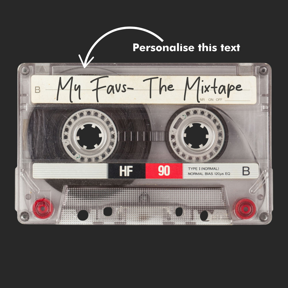 The Yililo Personalised Clear Cassette Tape Glass Chopping Board features a retro design with a “My Favs- The Mixtape” label and customizable text—an ideal nostalgic gift for any music lover.