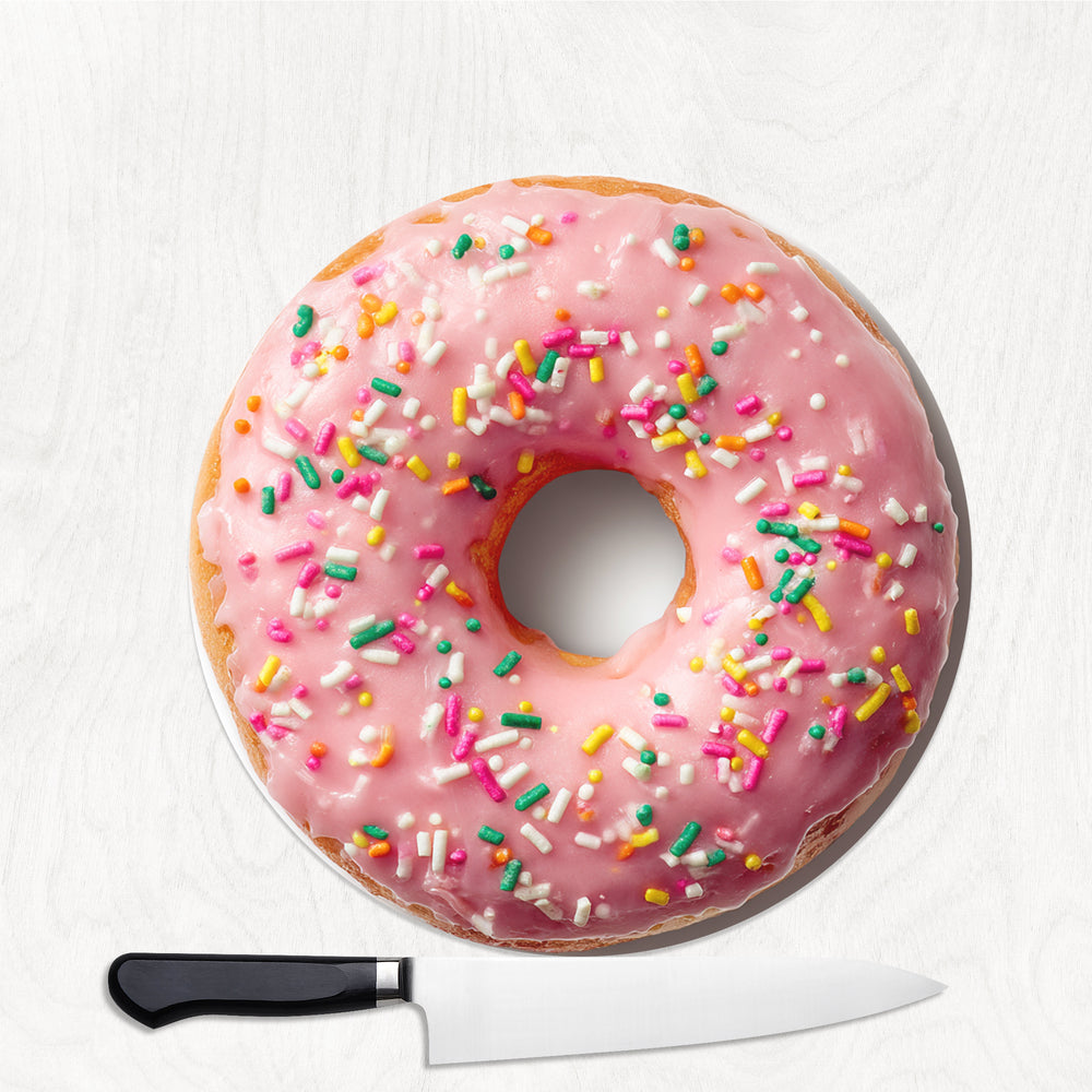30cm round smooth glass chopping board with pink sprinkle doughnut design