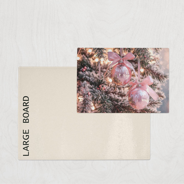 Large board with a Christmas tree design featuring pink ornaments and ribbons on a light gray background.