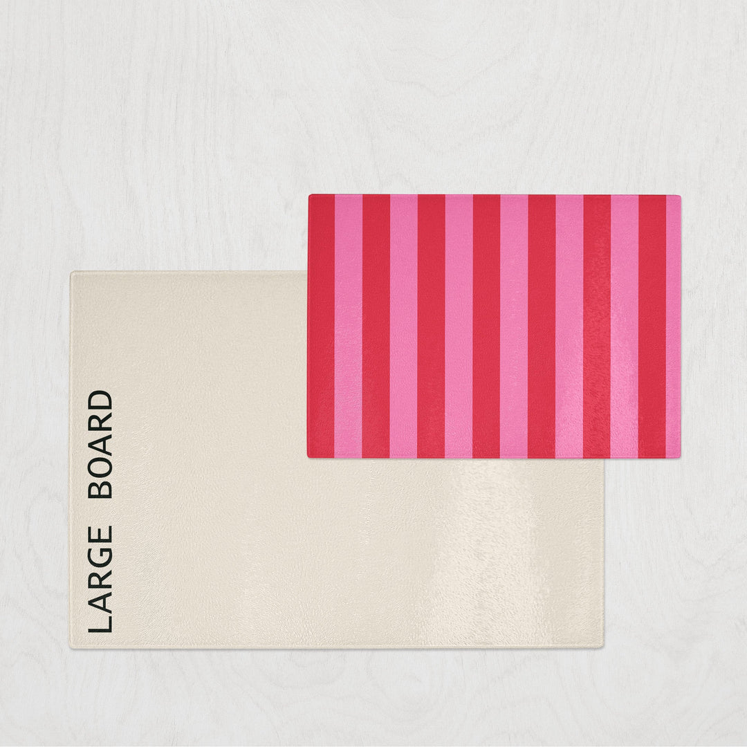 Large board with a pink and red striped pattern on a light gray background