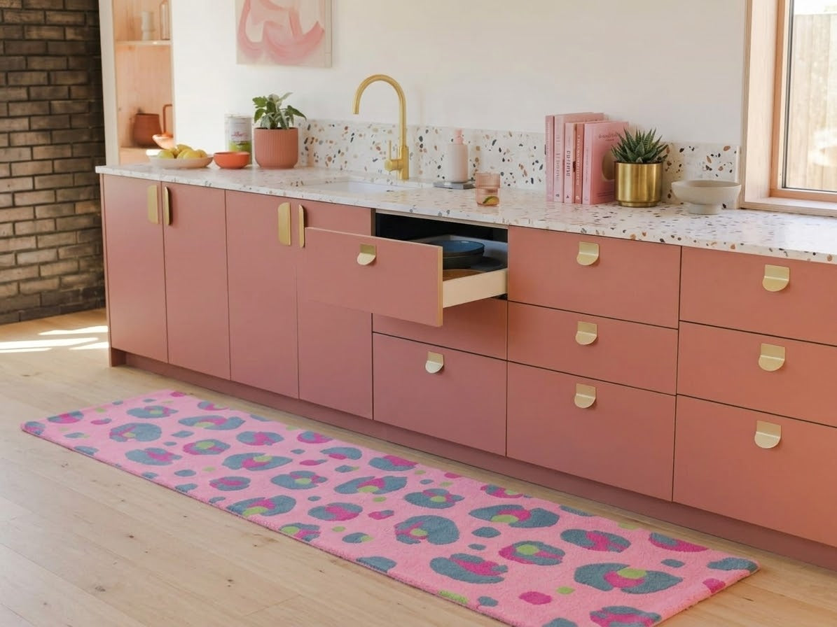Pink Leopard Print Rug by Yililo in a colourful kitchen