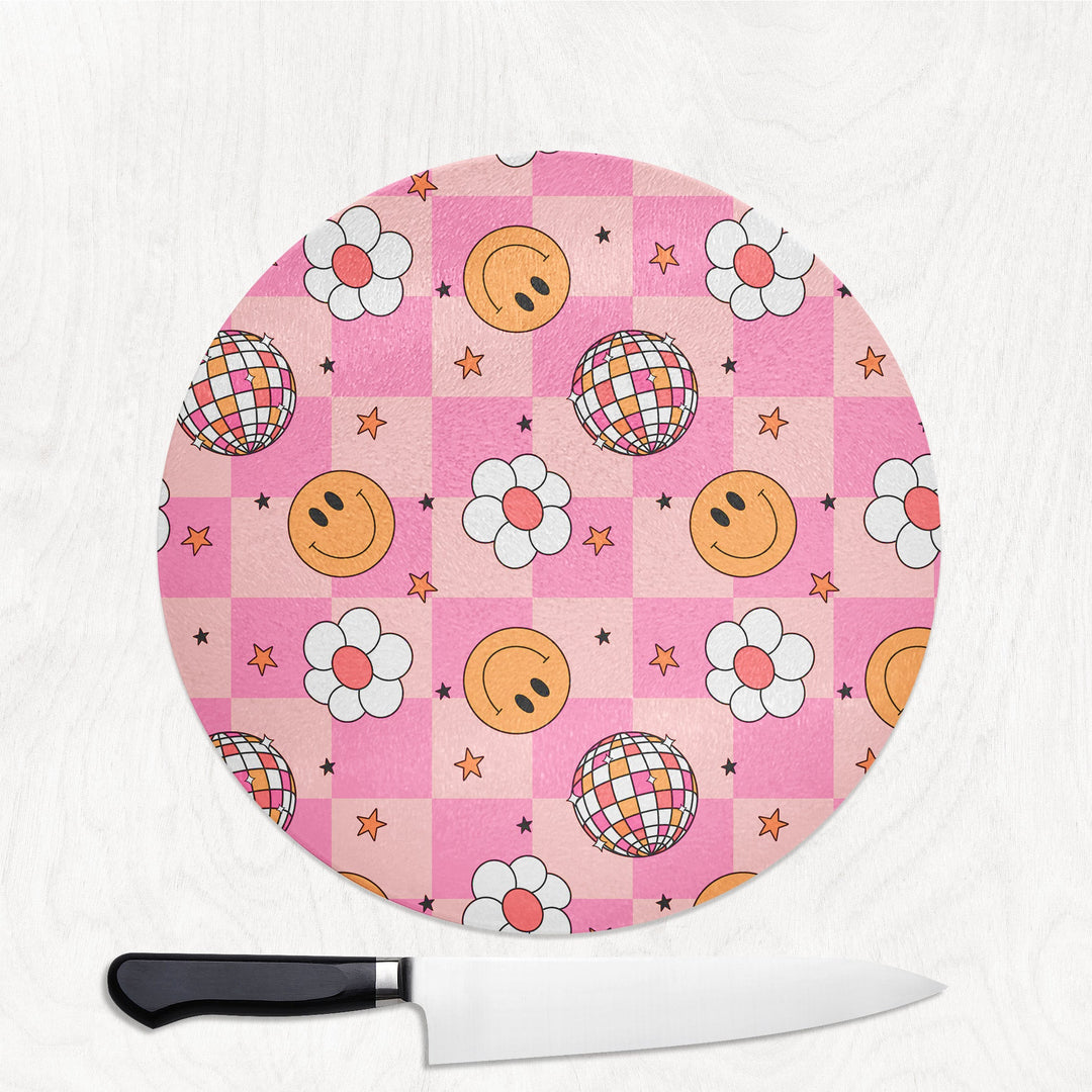 Round cutting board with a colorful 90 y2k smiley pattern on a white background