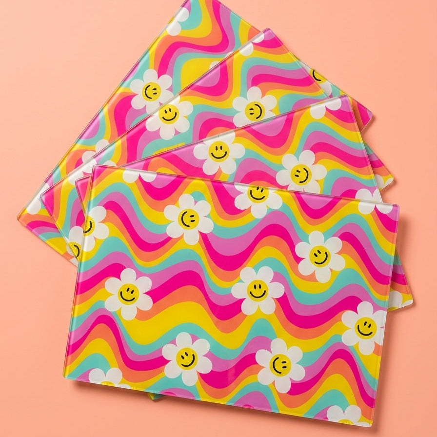 Colorful glass placemats with pastel
Rainbow wavy pattern and smiley face flowers on a pink background