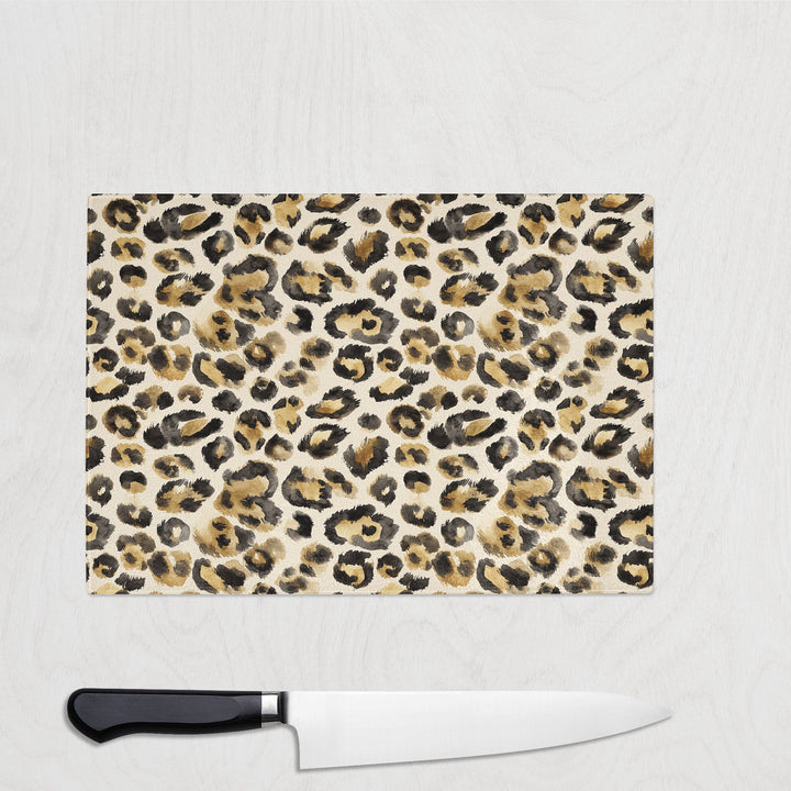 Soft leopard print glass chopping board in neutral animal print design