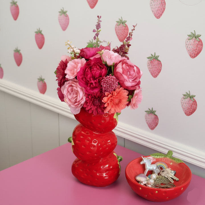Strawberry Stack Vase on a pink console