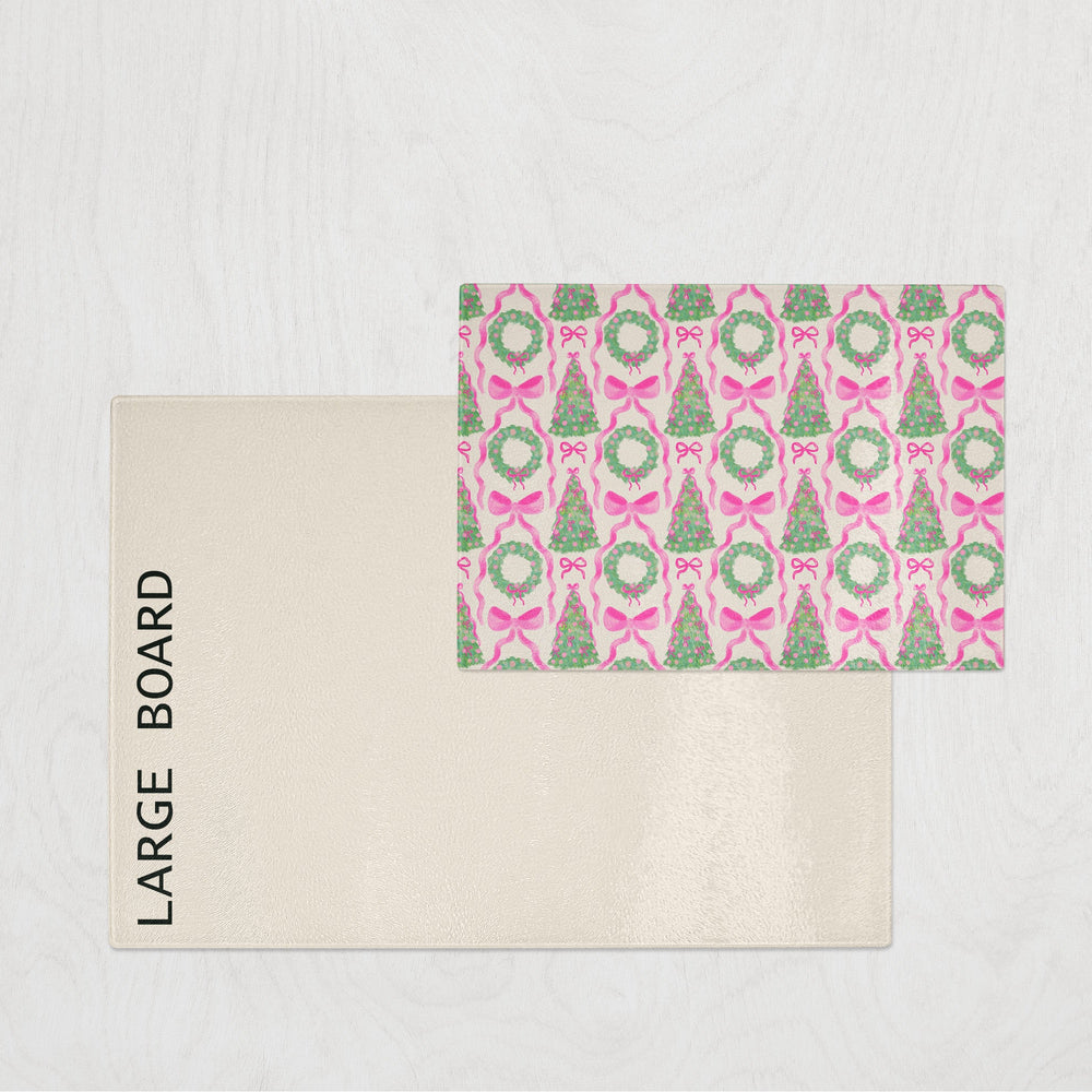 Large board with a pink and green patterned cover on a white background