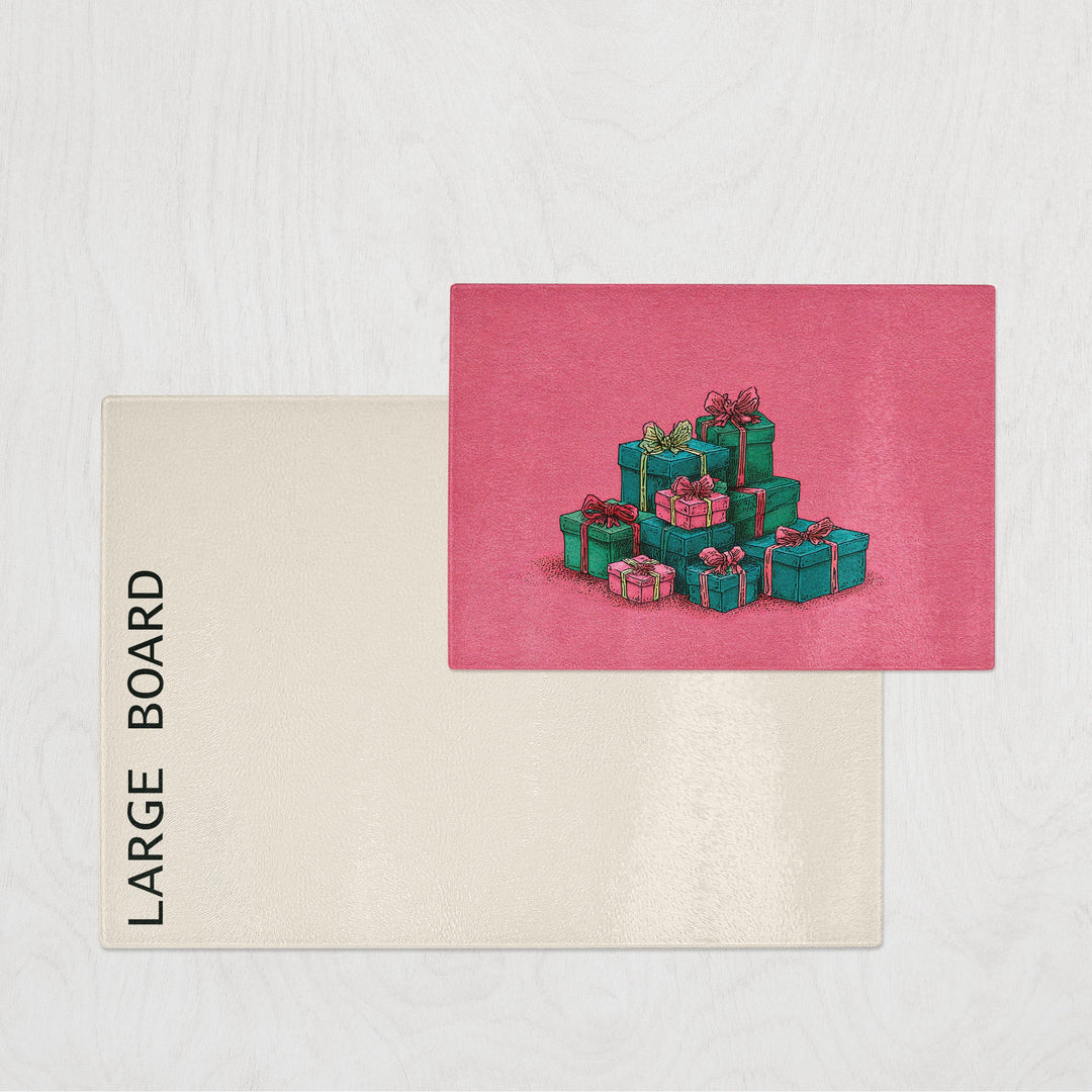 Large pink chopping board with a pink background featuring a stack of gift boxes.