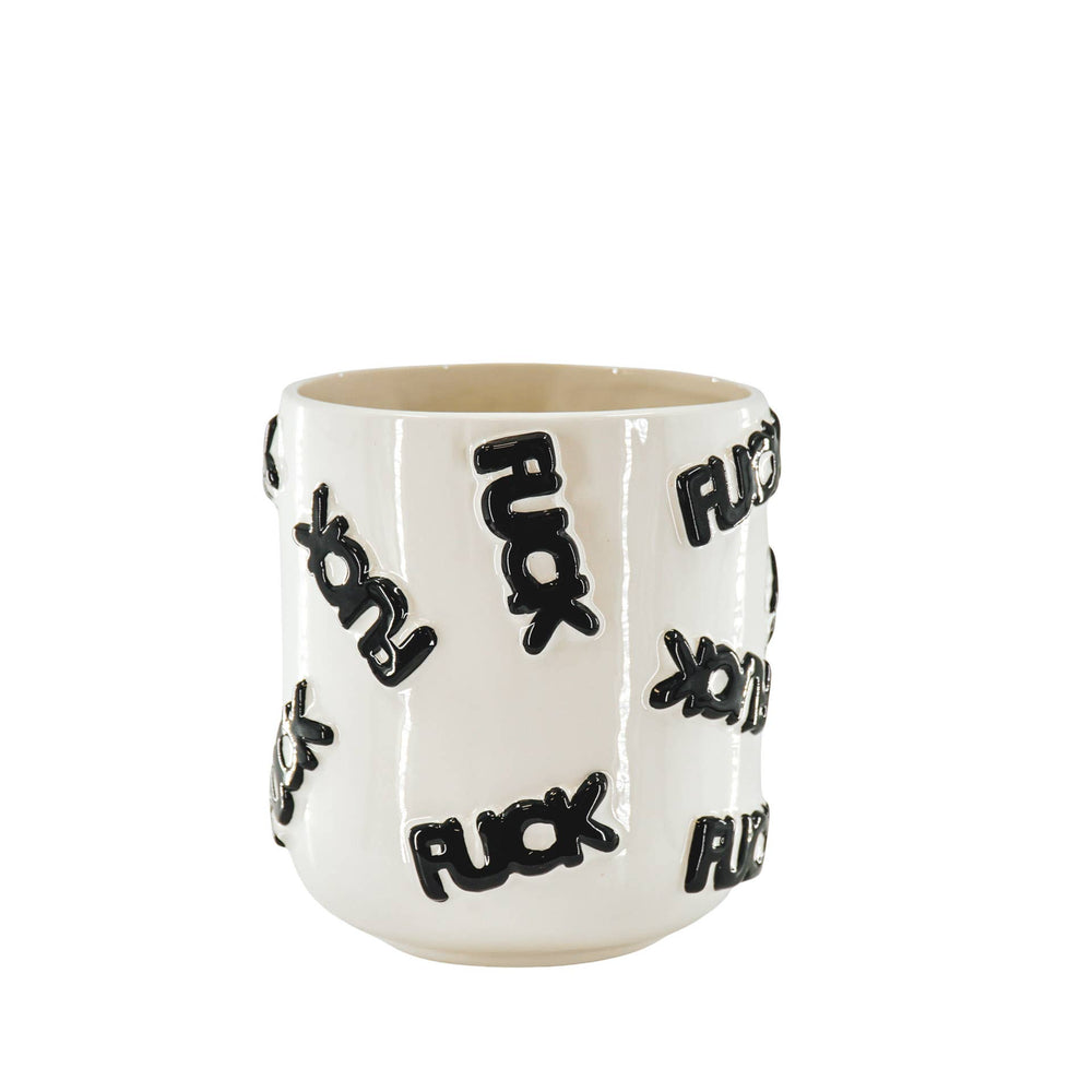 White mug with black text on a white background