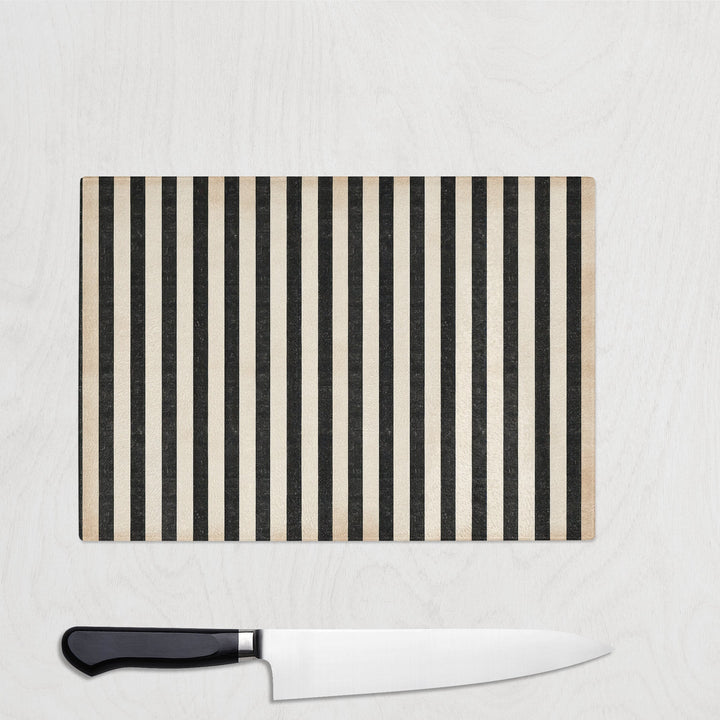 Glass chopping board with vertical black and cream stripes – Monochrome Stripe design