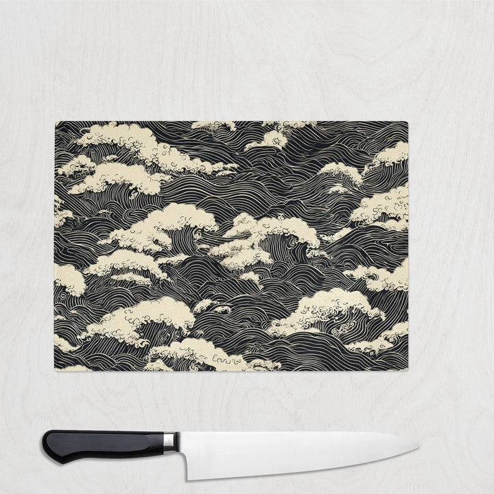 Glass chopping board with elegant black wave pattern on neutral background – Moonlit Tide design