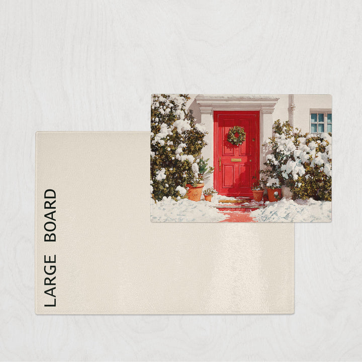 Christmas chopping board with red front door and snowy wreath scene