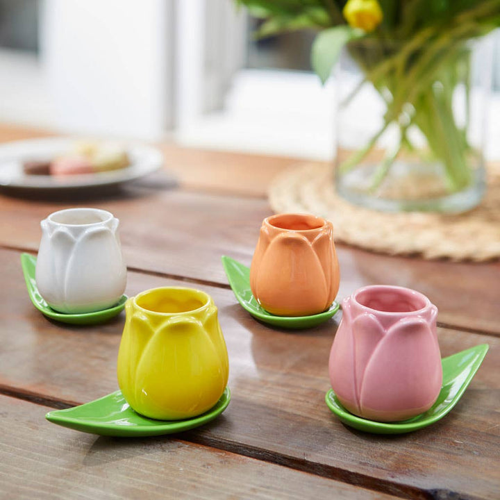 Set of 4 ceramic tulip coffee cups with leaf-shaped saucers in pink, orange, yellow and white