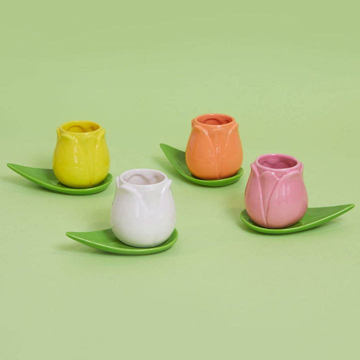 Set of 4 ceramic tulip coffee cups with leaf-shaped saucers in pink, orange, yellow and white