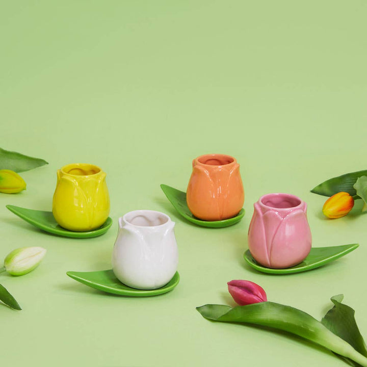 Set of 4 ceramic tulip coffee cups with leaf-shaped saucers in pink, orange, yellow and white