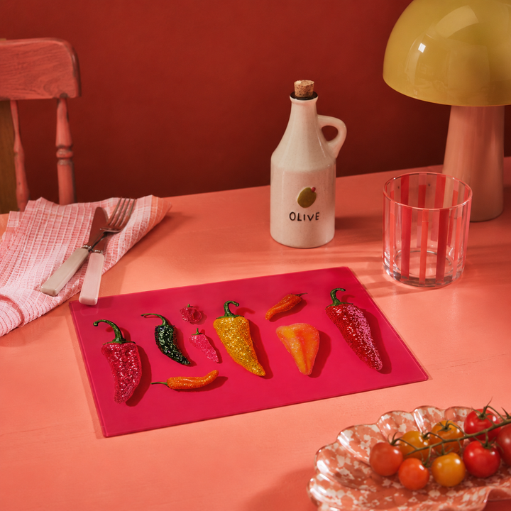 Yililo Glitter Chilli Colourful glass placemats, printed with bright glitter-effect chillies.