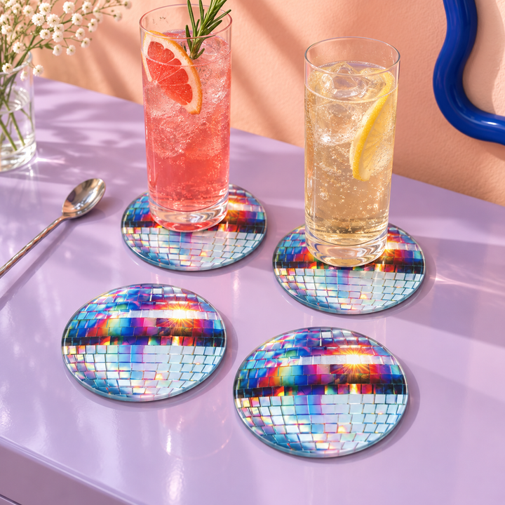 Rainbow Disco Ball 4 piece glass coaster set, four round glass coasters printed with rainbow mirrorball facets, matching the round chopping board