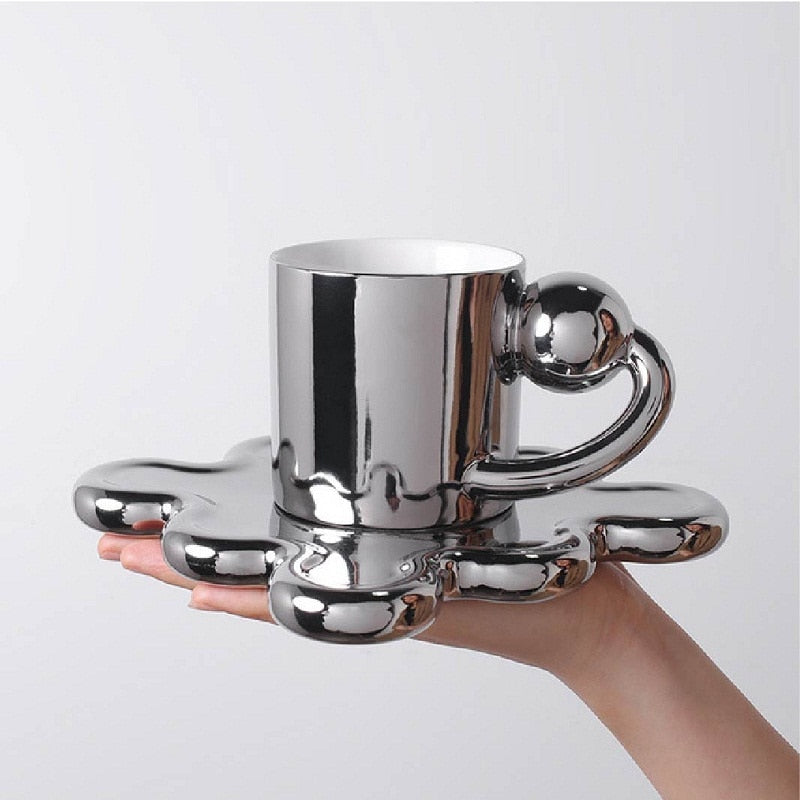 Chrome Coffee Mug With Rotating Ball Handle And Swirly Silver Saucer For Cup - Yililo